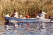 African American family boating on Lake Okeechobee.