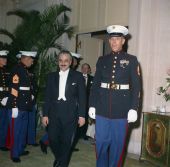 Kuwait ambassador Talat Al-Ghoussein with U.S. Marine escort at a Red Cross Ball at The Breakers in Palm Beach.