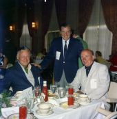Joseph H. Lauder, Homer Marshman and Max Sentlowitz dining at a cancer benefit at The Breakers in Palm Beach.