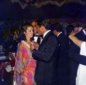 Miss Wendy Vanderbilt with writer Guy de la Valdene at the Coconuts' New Year's Eve party in Palm Beach.