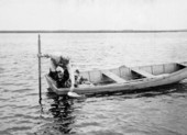 Duck hunting guide, Nathan Bradley, placing decoys in shallow water off shore at Homosassa Springs, Florida.