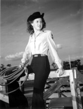 Wynona Beville perches on a fence - Lakeland, Florida