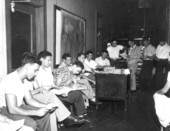 Students sitting in a hallway at Florida State College for Women - Tallahassee, Florida