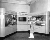 Judith Ann Smith examining the Veteran's exhibit at the State Fair - Tampa, Florida