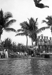Woman diving into pool at the Vanderbilt Hotel - Miami Beach, Florida.