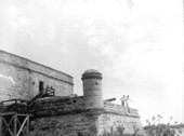 A couple looking down the scene from Fort Matanzas