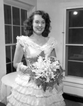 May Day party queen Doris Underwood holding bouquet - Tallahassee, Florida