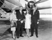 Miss USA 1965, Sue Downey, with pilots and a flight attendant