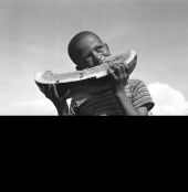 Willie James Poole eating watermelon - Leesburg, Florida