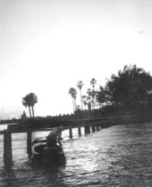 View of man in boat in Tampa Bay.