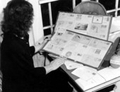 Mrs. Juanita Tucker looking over collection of framed letters from all around the world - Christmas, Florida