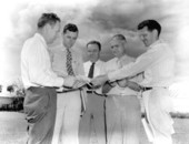 Specialists examining Everglades yellow wax beans - Belle Glade, Florida.