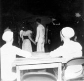 Sailors watching people dancing at the YMCA service club - Key West, Florida