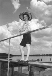 Marjorie King fishing from a pier on the Withlacoochee River - Dunnellon, Florida