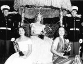 Flanked by Marine Corps officers, watermelon festival queen, Dolly Dean Beard of Leesburg and her court - Leesburg, Florida