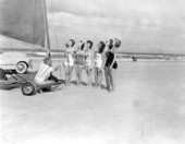 Henry Pierce instructs a group of girls on sand sailing - Daytona Beach, Florida
