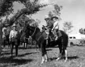 Michael Hill and Johnnie Rives on their horse - Okeechobee, Florida