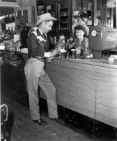 Charles Hart and June Lowery (later Boromei) at the soda fountain - Okeechobee, Florida