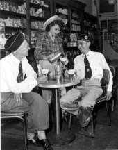 June Lowery (later Boromei) serving Harry Lamb and Vincent Boromei - Okeechobee, Florida.