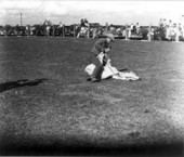 Cowboy ties up a cow - Okeechobee, Florida