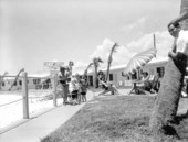 People pose at one of the tourist courts in Panama City