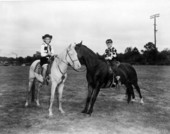 Pat Andrews and Paul C. Bowyer III on their horses at the N.W. Florida Championship Rodeo in Bonifay.