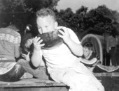Young boy participating in the watermelon eating contest at the watermelon festival - Leesburg, Florida