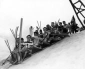 Skiers are pulled up the mountain by a lift - Fort Meade, Florida .