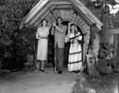 Mari Aldon, Richard Webb, and another actress holding guns pose at Fountain of Youth during "Distant Drums" premiere - Saint Augustine, Florida