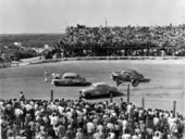Crowds watching an automobile race - Daytona Beach, Florida