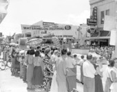 People gathered on the street to watch the parade at the watermelon festival - Leesburg, Florida