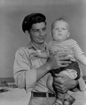 Captain Ira Vandergriff holding his son - Florida