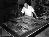 Earl Gresh working on wood at the Wood Paradise attraction in Saint Petersburg.
