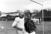 FAMU coach Jake Gaither with a football player during practice - Tallahassee, Florida.