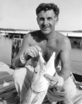 Fisherman proudly displaying a large barracuda - Florida Keys, Florida