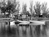 Boats gathered at patrol station for a Shark River boatacade