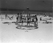 Riding the merry-go-round at Long Beach Resort - Panama City Beach.