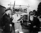 Civil War Veteran Billy Lundy with military police .