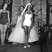 Frances Layton being crowned Miss Seaside Fiesta by previous queen Gloria Bell - New Smyrna Beach, Florida.