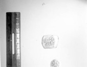 Two escudo gold pieces on display at McKee's Museum of Sunken Treasure - Plantation Key, Florida