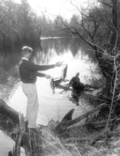Andy Harrold shows off his chipola bass catch to Floyd Miller - Marianna Region, Florida.