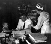Governor Collins receiving an inoculation for his trip to Russia - Tallahassee, Florida.