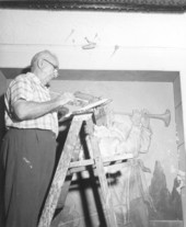 Roy Kennard working on a painting in the Palace Bar - Fernandina Beach, Florida