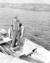 P. H. Wood proudly displaying two redfish - Odulund Island, Florida