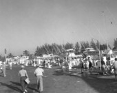 People visit a yacht basin during the World Series of Sport Fishing - Pompano Beach, Florida.