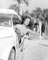 Gail Courtney waves from a car - Sarasota, Florida.