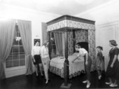 Visitors at the Gamble Plantation view the bedroom - Ellenton, Florida .