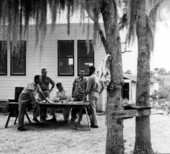 Men discussing the Little Manatee River boating trip