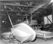 A worker working on a new boat's hull at boatyard of Carter Craft Boats - Panama City, Florida.
