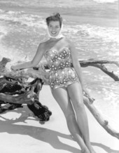 Kathy Magda models a bathing suit on the beach at Saint Andrews State Park.